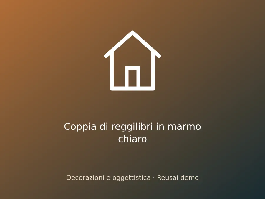Coppia di reggilibri in marmo chiaro